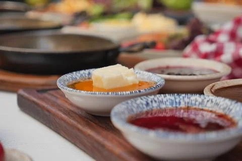 Colorful array of condiments served with traditional dishes Stock Photos