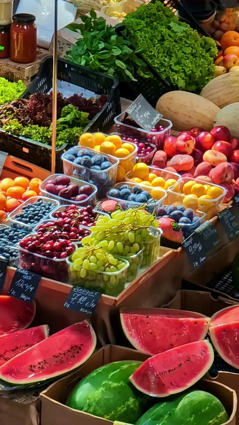 Colorful Array of Fresh Fruits and Vegetables at Vibrant Market Stall Stock Footage 336332387