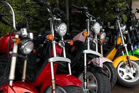 A Colorful Array of Scooters Highlighting the Diversity of Two-Wheeled Fun Stock Photos