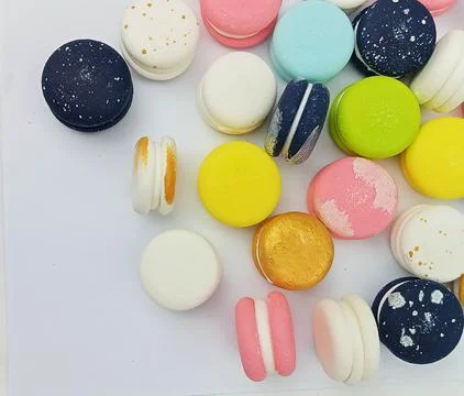 Colorful assorted macarons on white background Stock Photos