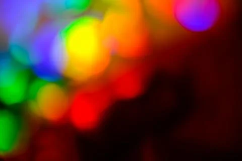 Colorful background with defocused lights. Multicolor blurred background. Bly Stock Photos