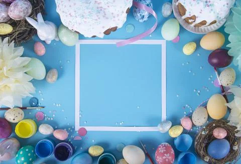 Colorful background with Easter eggs on blue background. Happy Easter concept Stock Photos