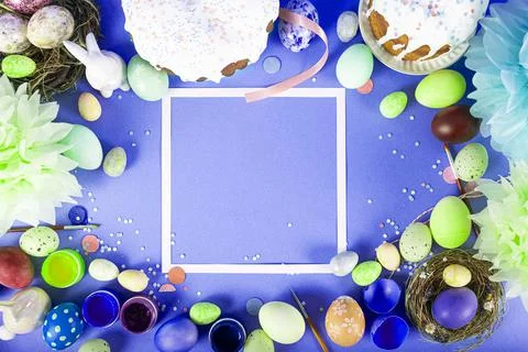 Colorful background with Easter eggs on blue background. Happy Easter concept Stock Photos