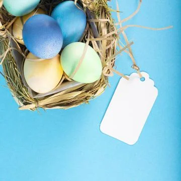 Colorful background with Easter eggs on blue background. Happy Easter concept Stock Photos