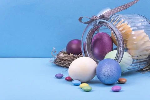 Colorful background with Easter eggs on blue background. Happy Easter concept Stock Photos