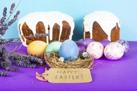 Colorful background with Easter eggs on lavander and blue background. Happy E Stock Photos