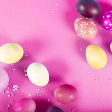 Colorful background with Easter eggs on pink background. Happy Easter concept Stock Photos