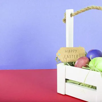 Colorful background with Easter eggs on red and blue background. Happy Easter Stock Photos