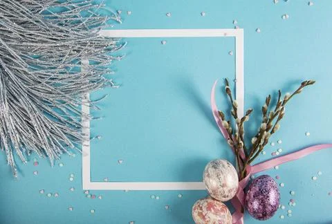 Colorful background with frame, Easter eggs on blue background. Happy Easte.. Stock Photos