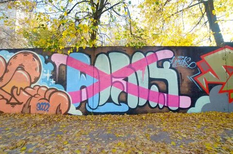 Colorful background of graffiti painting artwork with bright aerosol outlines on Stock Photos