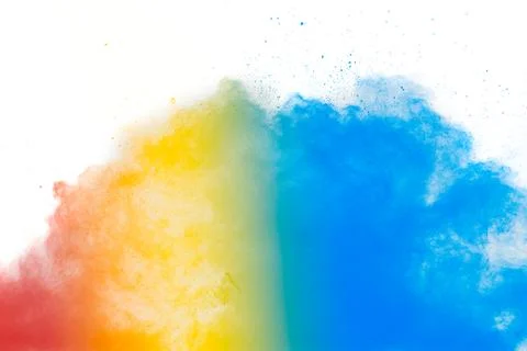 Colorful background of pastel powder explosion.Multi colored dust splash on.. Stock Photos