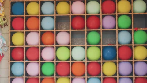 Colorful balloons arranged in pattern. Bright multicolored balloons in geometric Stock Footage 335315878