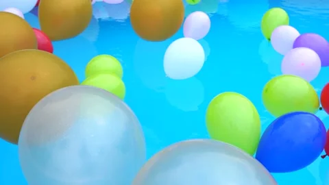 Colorful balloons in the pool Stock Footage 200932514