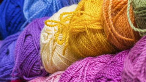 Colorful balls of wool thread for knitting. Closeup. Video stock 125205131