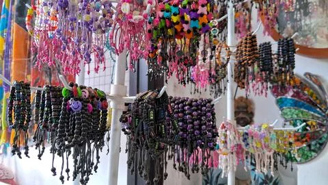 Colorful beaded bracelets with various patterns. Handmade souvenirs Foto stock