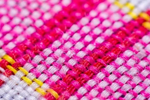 Colorful beads arranged in a pattern with pink and yellow Stock Photos