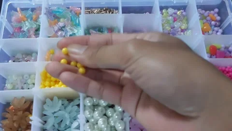Colorful beads for making rings, bracelets and necklaces. for women's jewelry Stock Footage 273294975