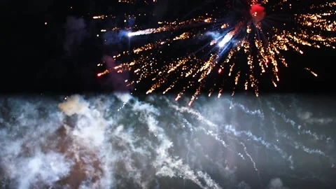 Colorful beautiful fireworks exploding at night Stock Footage 133677362