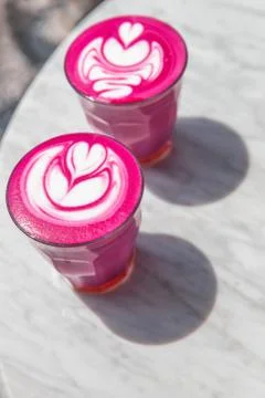 Colorful beetroot super latte on marble background Stock Photos