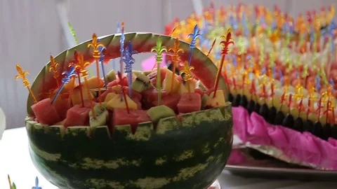 Colorful berries heart on buffet table Stock Footage 74883058