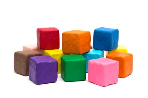 Colorful blocks cubes made of modeling clay Stock Photos