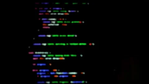 Colorful blurred code moves on dark screen creating abstract programming ba.. 動画素材 334336291