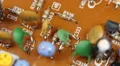 Colorful Board Transistor Capacitors Resistors Electronic Components Motherboard HD Footage