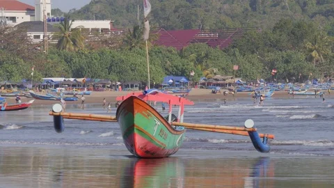 Colorful boat on beach in Pangandaran Java Indonesia Stock Footage 82079881