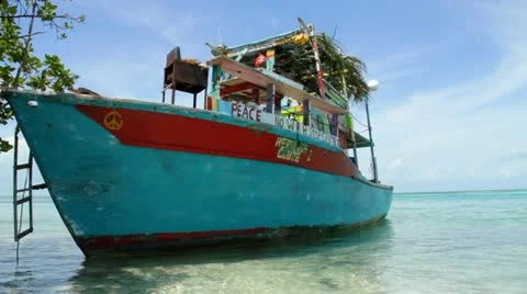 Colorful Boat on Belize Caye Stock Footage