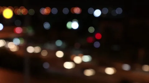 Colorful bokeh light created by moving traffic transportation at night. Stock Footage 94371506