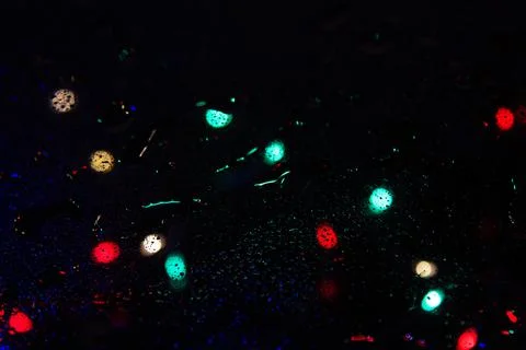 Colorful bokeh lights on a dark background Stock Photos