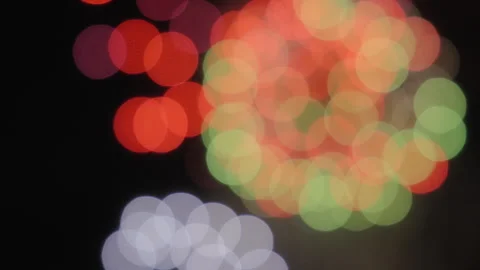 Colorful bokeh lights of fireworks exploding on the night sky Stock Footage 319805388