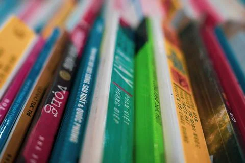 Colorful Bookself closeup, dramatic view Stock Photos