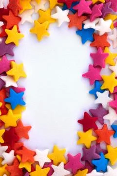 Colorful bright background, multi-colored stars. Sweet nice background candy. Stock Photos