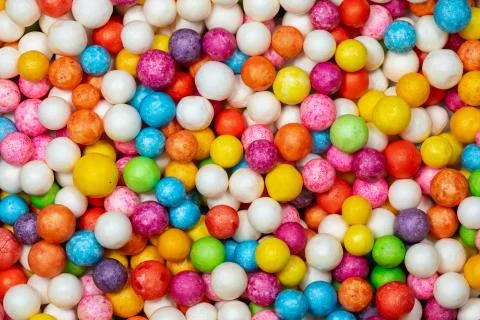 Colorful bright background, multi-colored balls. Sweet nice background candy. Stock Photos