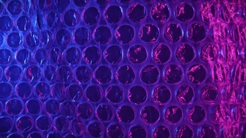 Colorful Bubble Wrap Texture Under Neon Lighting Stock Footage 309288581