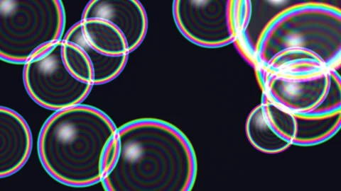 Colorful bubbles floating against a dark background Vídeo Stock 338116562