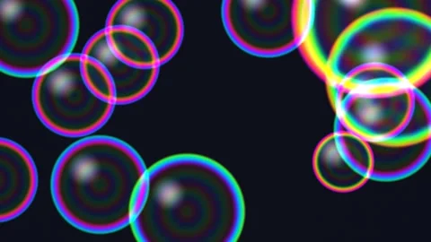 Colorful bubbles floating against a dark background Vídeo Stock 338126904
