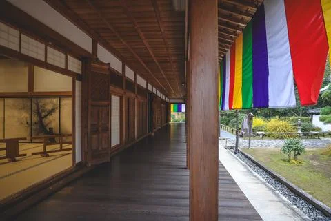 Colorful Buddhist Flags Draped Over a Traditional Temple Porch i Nov 28 2025 Fotos Stock