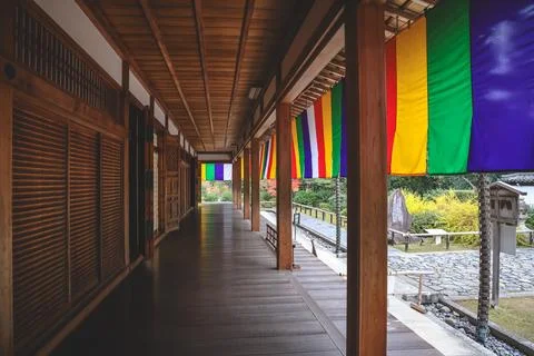 Colorful Buddhist Flags Draped Over a Traditional Temple Porch i Nov 28 2025 Fotos Stock