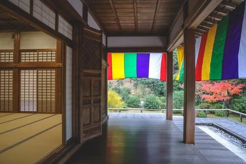 Colorful Buddhist Flags Draped Over a Traditional Temple Porch i Nov 28 2025 Fotos Stock