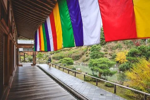 Colorful Buddhist Flags Draped Over a Traditional Temple Porch i Nov 28 2025 Fotos Stock