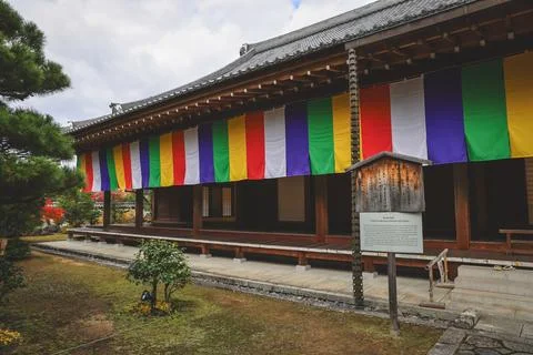 Colorful Buddhist Flags Draped Over a Traditional Temple Porch i Nov 28 2025 Fotos Stock