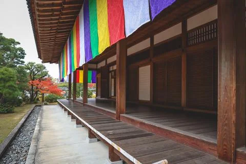 Colorful Buddhist Flags Draped Over a Traditional Temple Porch i Nov 28 2025 Fotos Stock