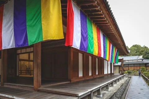 Colorful Buddhist Flags Draped Over a Traditional Temple Porch i Nov 28 2025 Fotos Stock