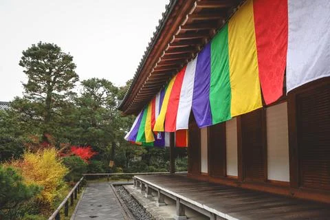 Colorful Buddhist Flags Draped Over a Traditional Temple Porch i Nov 28 2025 Fotos Stock