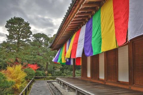 Colorful Buddhist Flags Draped Over a Traditional Temple Porch i Nov 28 2025 Fotos Stock