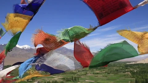 Colorful Buddhist prayer flags at temple in the Shanti Stupa. Leh, Ladakh, India Stock Footage 83975871