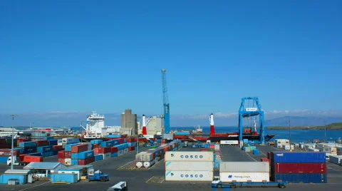 Colorful busy Shipyard in summer, container ship off loading, Reykjavik, Iceland Stock Footage