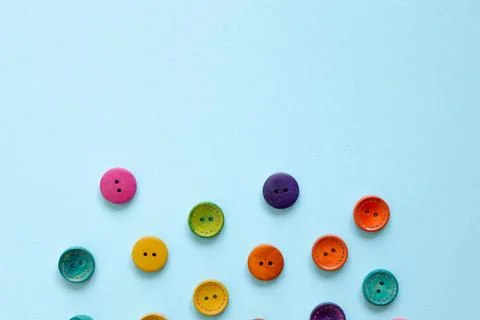 Colorful button on blue background Stock Photos